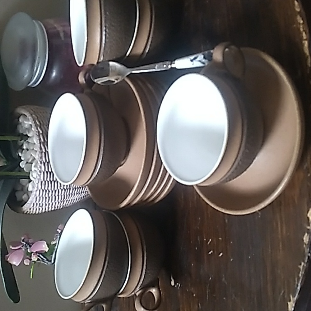 A SET OF 6, MADE IN ENGLAND DENBY STONEWARE TEA CUPS & SAUCERS. #222